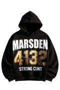 Black hoodie with text on a textured wall background