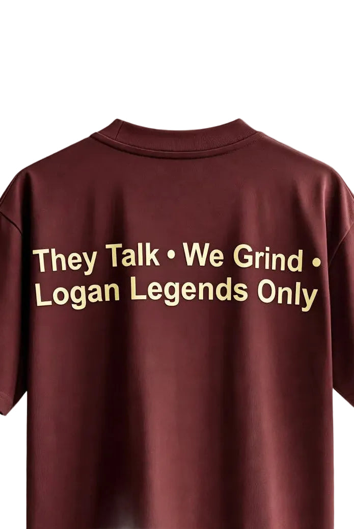 Maroon t-shirt with yellow text on a beige background