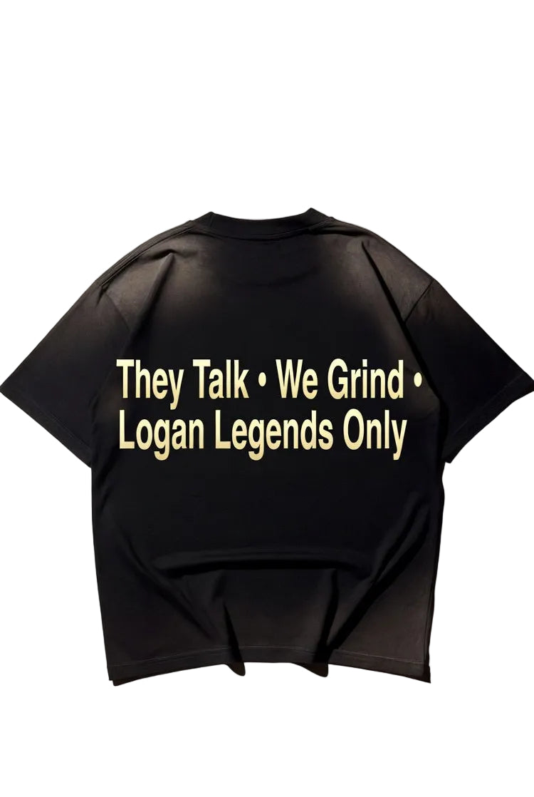 Black t-shirt with yellow text on a white background